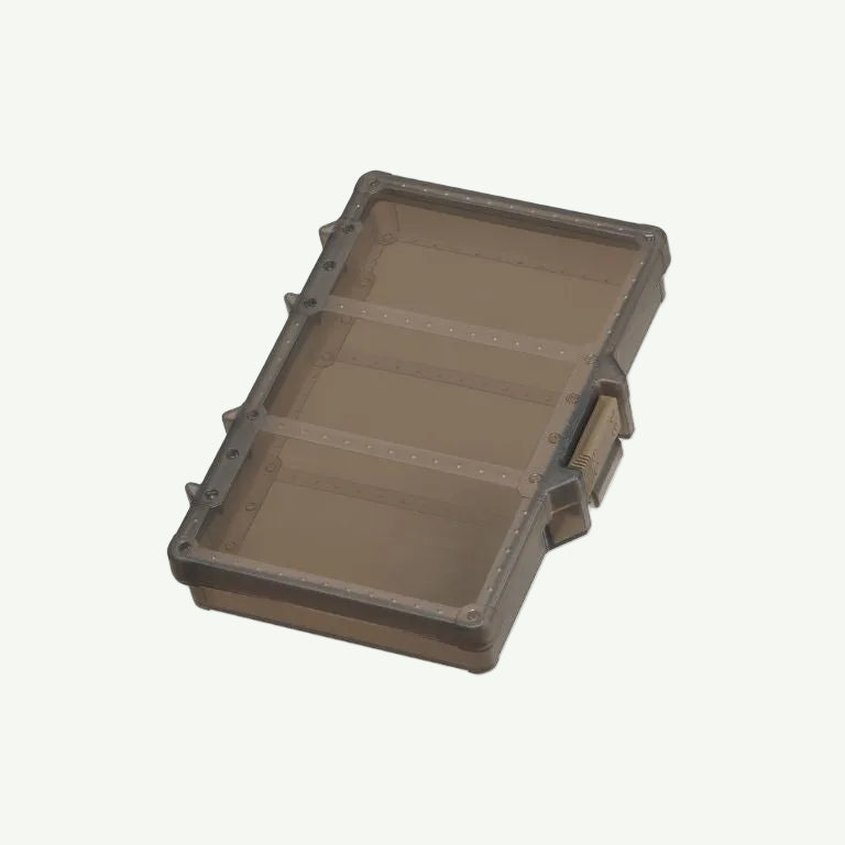 A stack of gray Daiichiseiko MC Case # 138 F Tackle Boxes with a label showing the product number and brand.