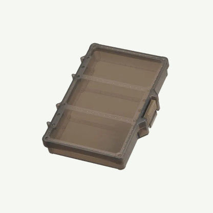 A stack of gray Daiichiseiko MC Case # 138 F Tackle Boxes with a label showing the product number and brand.