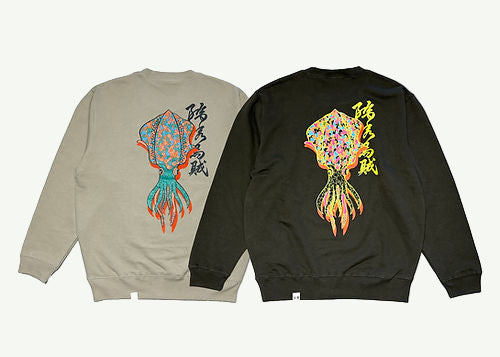 Two sweatshirts, one beige and one black, with colorful squid designs on the back.